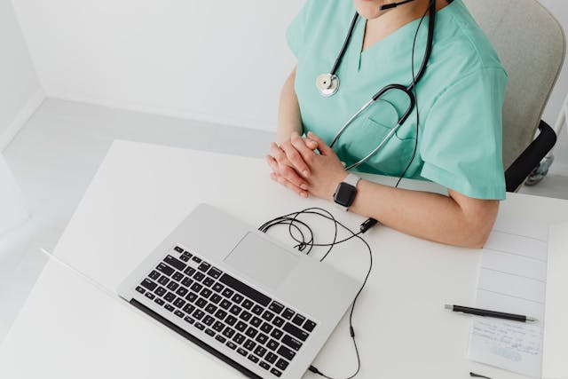Doctor using a laptop